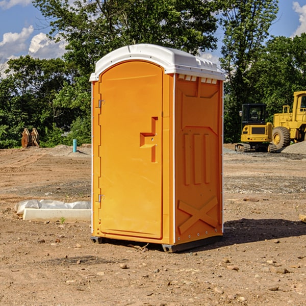 how often are the porta potties cleaned and serviced during a rental period in Buckingham